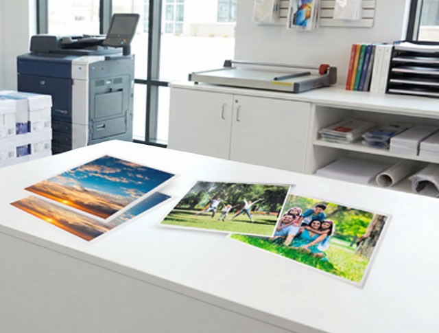 Laminating pouches on a desk in a print shop