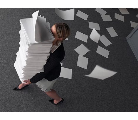 Why Binding Papers Does Matter Woman with papers flying away